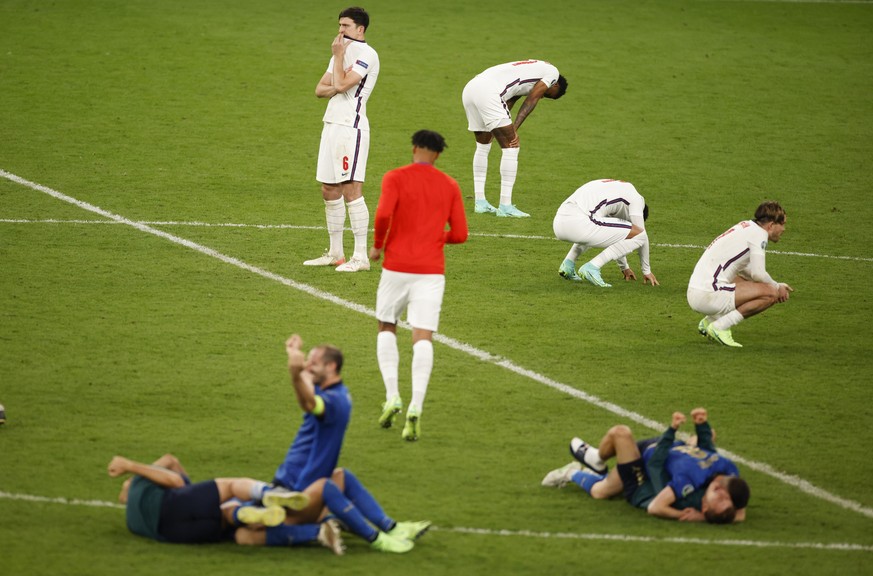England players react after losing a penalty shootout at the Euro 2020 soccer championship final between England and Italy at Wembley stadium in London, Sunday, July 11, 2021. (John Sibley/Pool Photo  ...