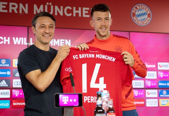 Soccer Football - Bayern Munich unveil Ivan Perisic - Saebener Strasse, Munich, Germany - August 14, 2019 Bayern Munich coach Niko Kovac and Ivan Perisic pose with the club shirt during the unveiling  ...