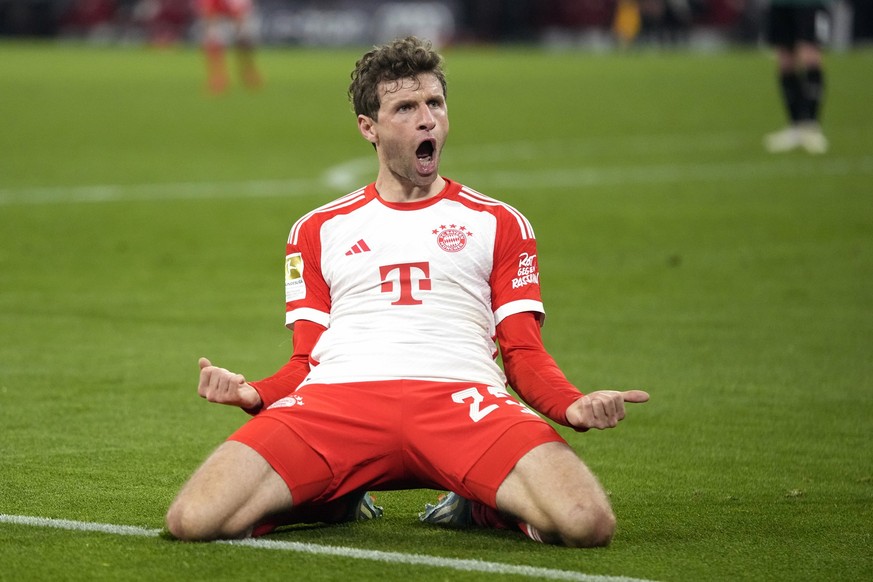 FILE - Bayern&#039;s Thomas Mueller celebrates a goal that was later disallowed by a VAR decision during the German Bundesliga soccer match between Bayern Munich and Stuttgart in Munich, Germany, Sund ...