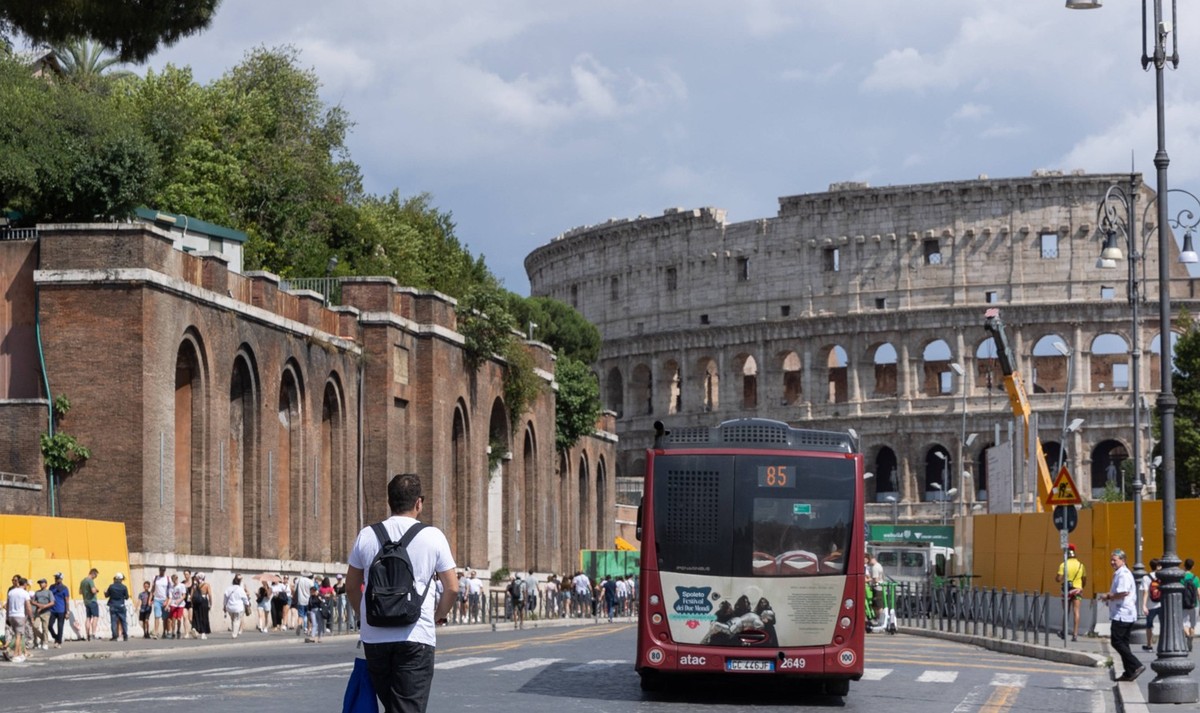 Italy: Tourists near Colosseum in Rome View of Via dei Fori Imperiali in Rome Rome Italy Copyright: MatteoxNardone