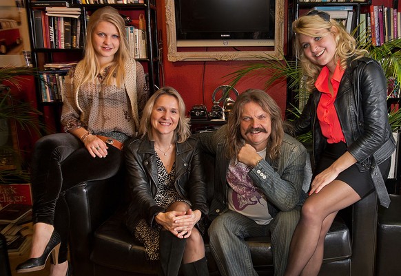 TUTZING, GERMANY - OCTOBER 18: Musician Leslie Mandoki, his wife Eva (2nd from l) and daughters Julia and Lara pose during a get-together for the launch of Mandokis new Album &#039;BudaBest&#039; on O ...