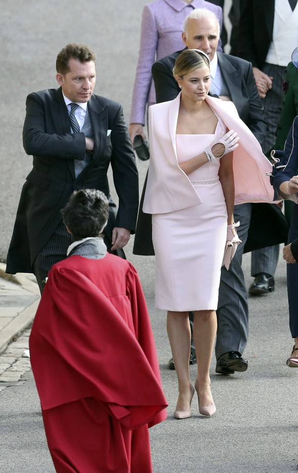 Holly Valance arrives for the wedding of Princess Eugenie of York and Jack Brooksbank at St George’s Chapel, Windsor Castle, near London, England, Friday Oct. 12, 2018. (Andrew Matthews/Pool via AP)