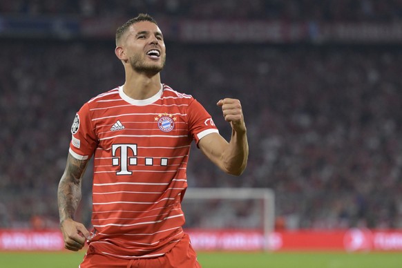 Bayern's Lucas Hernandez celebrates after scoring his side's opening goal during the Champions League, group C soccer match between Bayern Munich and Barcelona at the Allianz Arena in Munich ...