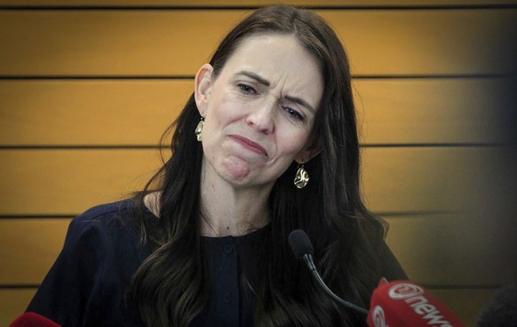 New Zealand Prime Minister Jacinda Ardern grimaces as she announces her resignation at a press conference in Napier, New Zealand Thursday, Jan. 19, 2023. Ardern says that she will not contest this yea ...