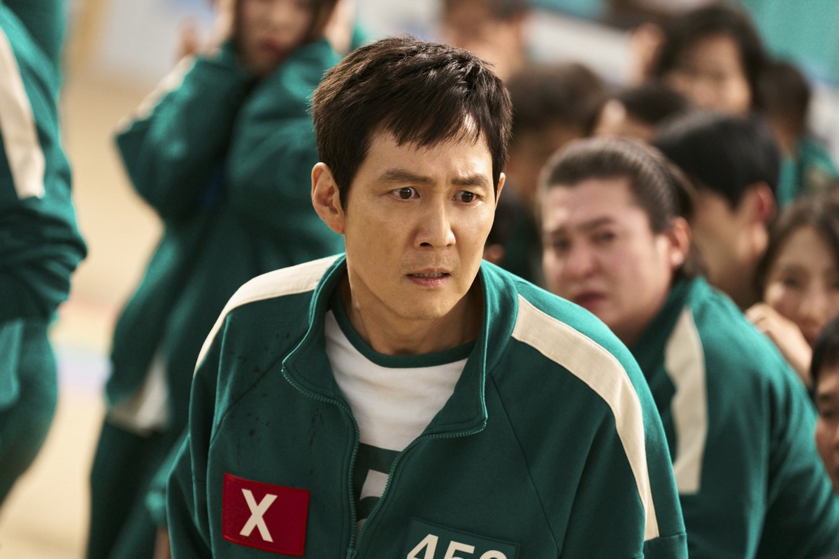 This image released by Netflix shows Lee Jung-jae in a scene from &quot;Squid Game.&quot; (No Ju-han/Netflix via AP)