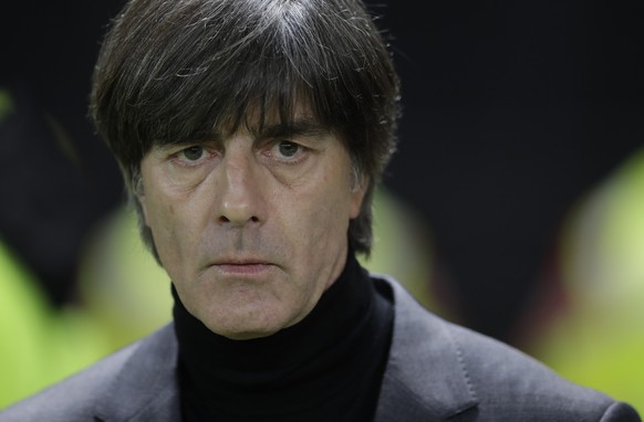 Germany head coach Joachim Loew looks from the bench prior to the international friendly soccer match between Germany and Brazil in Berlin, Germany, Tuesday, March 27, 2018. (AP Photo/Michael Sohn)