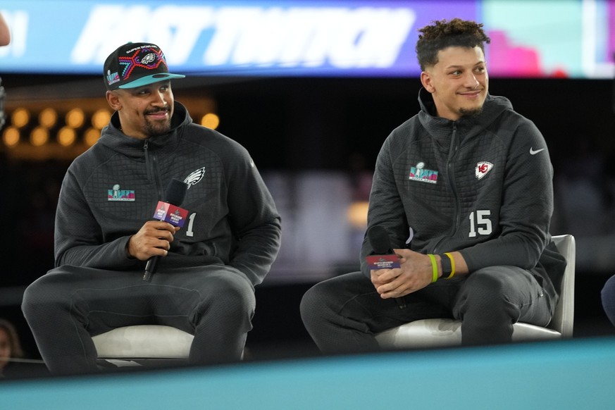 Kansas City Chiefs quarterback Patrick Mahomes, right, and Philadelphia Eagles quarterback Jalen Hurts speak to the media during the NFL football Super Bowl 57 opening night, Monday, Feb. 6, 2023, in  ...