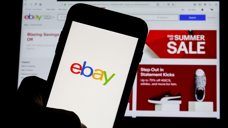 The eBay logo is pictured on a phone screen in this photo illustration in New York, U.S., July 23, 2019. REUTERS/Brendan McDermid/Illustration
