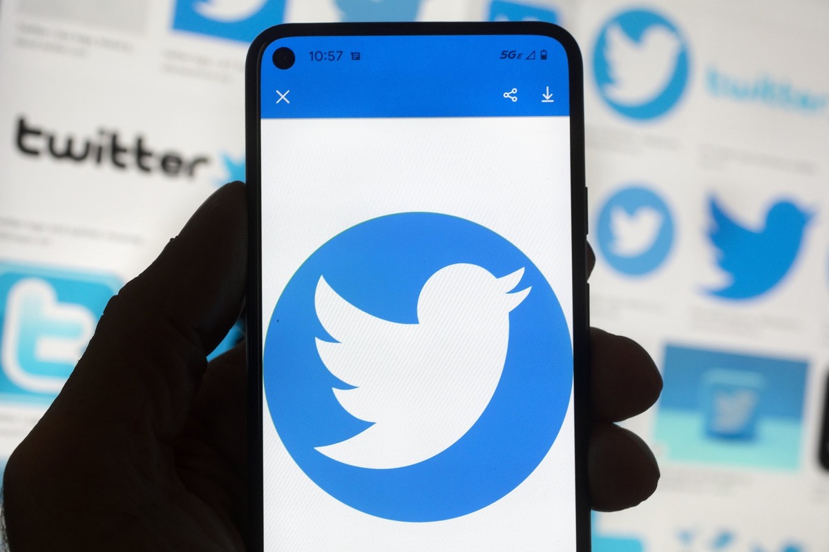 The Twitter logo is seen on a cell phone, Friday, Oct. 14, 2022, in Boston. While amount of chaos is expected after a corporate takeover, as are layoffs and firings, Elon Musk’s murky plans for Twitte ...