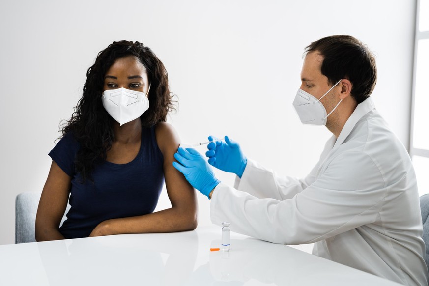 African American Patient Getting Covid-19 Vaccine Injection