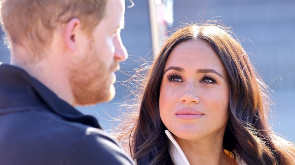 THE HAGUE, NETHERLANDS - APRIL 17: Prince Harry, Duke of Sussex and Meghan, Duchess of Sussex attend the Athletics Competition during day two of the Invictus Games The Hague 2020 at Zuiderpark on Apri ...