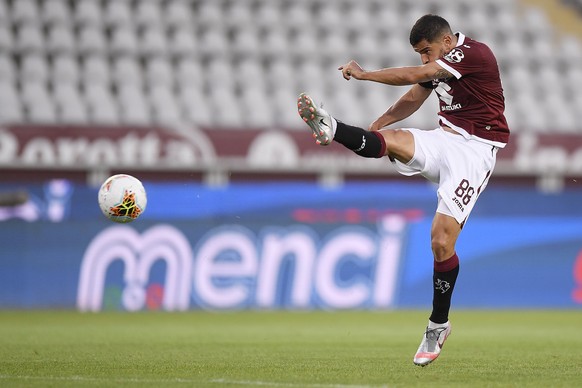 Torino's Tomas Rincon fires a shot during the Serie A soccer match between Torino and Parma, at the Olympic Stadium in Turin, Italy, Saturday, June 20, 2020. Serie A restarts Saturday following the ea ...
