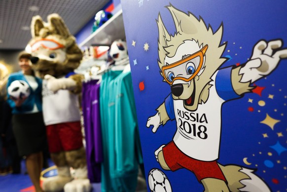 NIZHNY NOVGOROD, RUSSIA - APRIL 10, 2018: Wolf Zabivaka, the official mascot of the 2018 FIFA World Cup WM Weltmeisterschaft Fussball at the opening of an official shop selling Russia 2018 FIFA World  ...