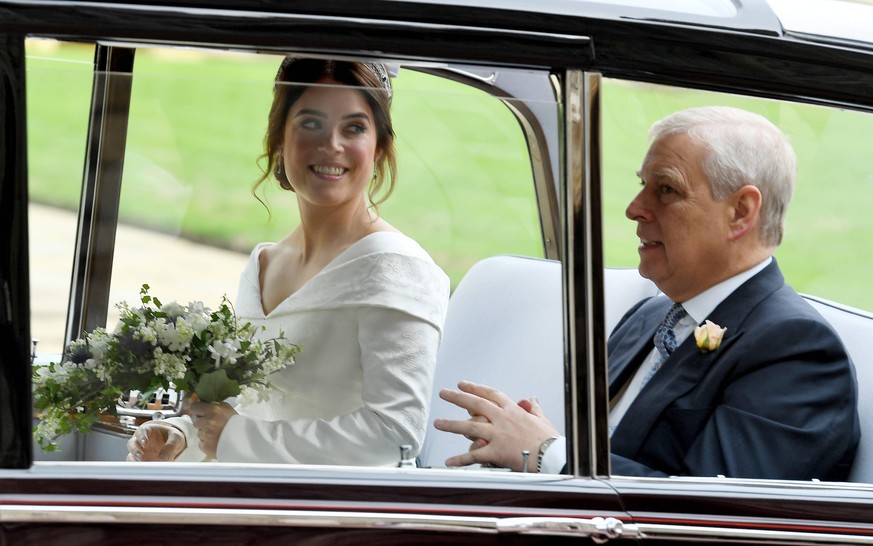 . 12/10/2018. Windsor, United Kingdom. Princess Eugenie of York and Mr Jack Brooksbank Wedding. Princess Eugenie and Prince Andrew The wedding of Princess Eugenie and Jack Brooksbank, Pre-Ceremony, Wi ...