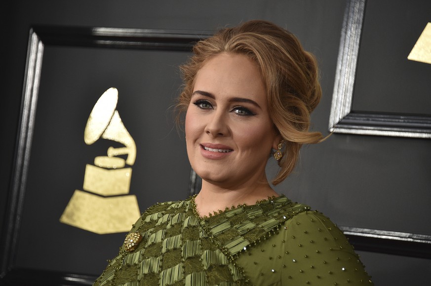 FILE - In this Feb. 12, 2017, file photo, Adele arrives at the 59th annual Grammy Awards at the Staples Center in Los Angeles. Adele and her husband Simon Konecki have separated. The pop singer’s repr ...