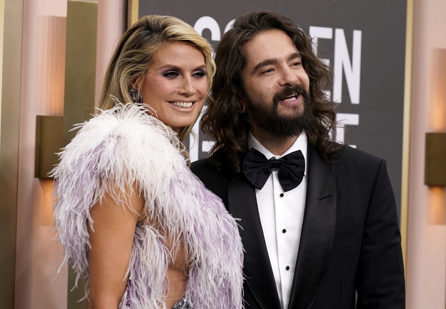 Heidi Klum, left, and Tom Kaulitz arrive at the 80th annual Golden Globe Awards at the Beverly Hilton Hotel on Tuesday, Jan. 10, 2023, in Beverly Hills, Calif. (Photo by Jordan Strauss/Invision/AP)