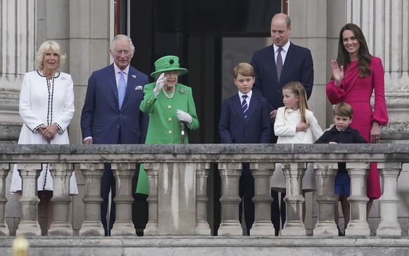 From left: Camilla Duchess of Cornwall, Prince Charles, Queen Elizabeth II, Prince George, Prince William, Princess Charlotte, Prince Louis, and Kate, Duchess of Cambridge appear on the balcony of Buc ...