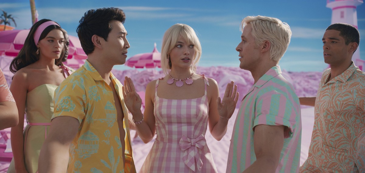 This image released by Warner Bros. Pictures shows, from left, Emma Mackey, Simu Liu, Margot Robbie, Ryan Gosling and Kingsley Ben-Adir in a scene from "Barbie." (Warner Bros. Pictures via A ...