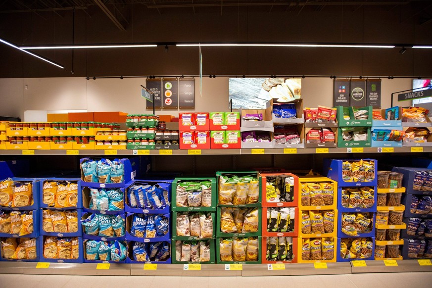Syndication: Tallahassee Democrat, A large variety of snacks line the shelves at the Aldi located on Apalachee Parkway. The grocery store is officially open after a ribbon cutting ceremony was held Th ...