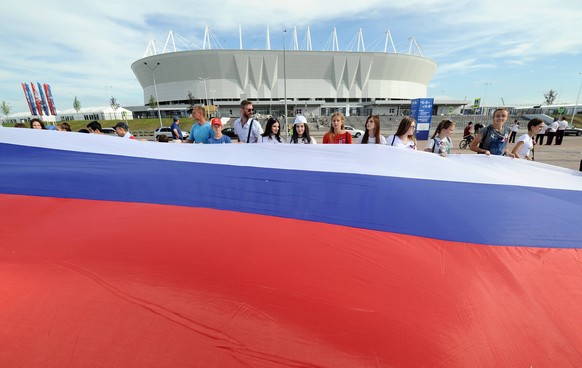 ROSTOV-ON-DON, RUSSIA - JUNE 12, 2018: The largest Russian flag unfolded near Rostov Arena, a 2018 FIFA World Cup venue, to mark Russia Day, a national holiday celebrated annually on June 12, in Rosto ...