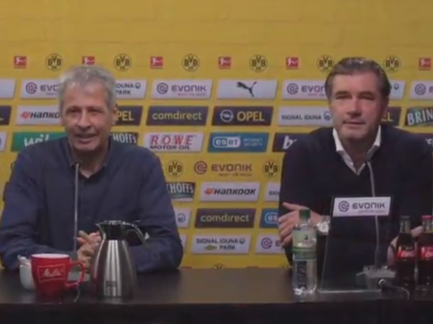 Sorry für die schlechte Qualität dieses Screenshots. Ganz so fahl sah Lucien Favre (l., neben ihm Michael Zorc) dann doch nicht aus.