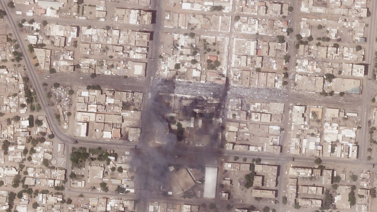 This satellite photo from Planet Labs PBC shows fires and destroyed market stalls in a commercial area of northern Khartoum, Sudan, Tuesday, April 18, 2023. Fighting between forces loyal to dueling ge ...