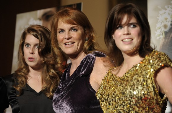 FILE - Sarah Ferguson, Duchess of York, center, a producer of the film &quot;The Young Victoria,&quot; poses with her daughters Princess Beatrice of York, left, and Princess Eugenie of York at the pre ...