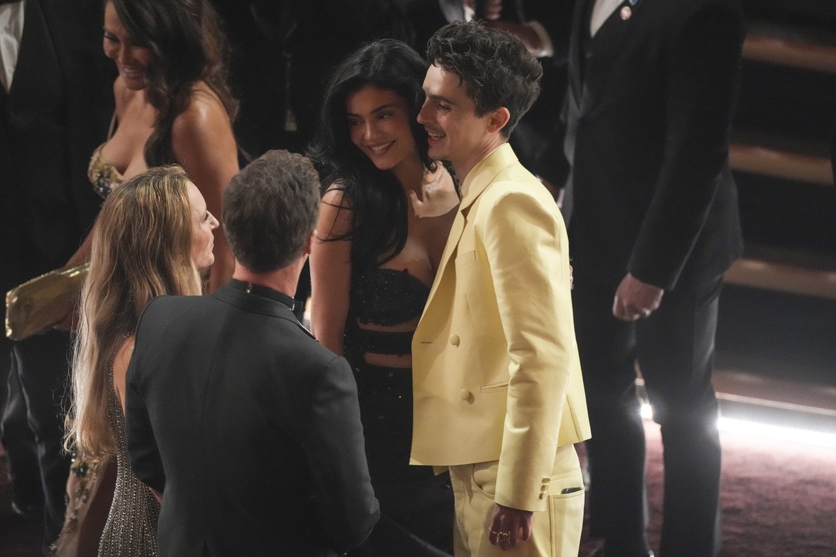 Shauna Robertson, from left, Edward Norton, Kylie Jenner, and Timothee Chalamet in the audience during the Oscars on Sunday, March 2, 2025, at the Dolby Theatre in Los Angeles. (AP Photo/Chris Pizzell ...