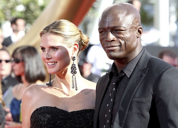 LOS ANGELES, CA - SEPTEMBER 20: TV personality Heidi Klum (L) and singer Seal arrive at the 61st Primetime Emmy Awards held at the Nokia Theatre on September 20, 2009 in Los Angeles, California. (Phot ...