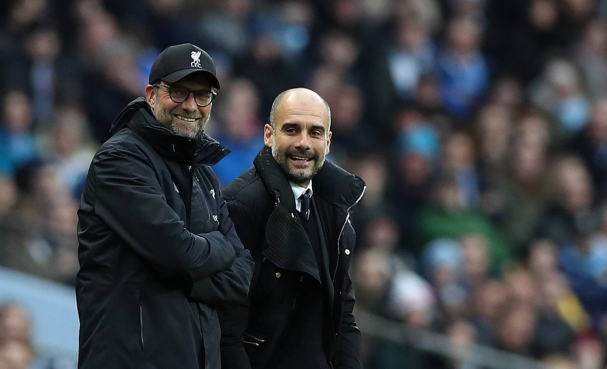 Manchester City Manager Pep Guardiola and Jurgen Klopp manager of Liverpool during the English Premier League match at The Etihad Stadium, Manchester . Picture date: March 19th 2017. Pic credit should ...