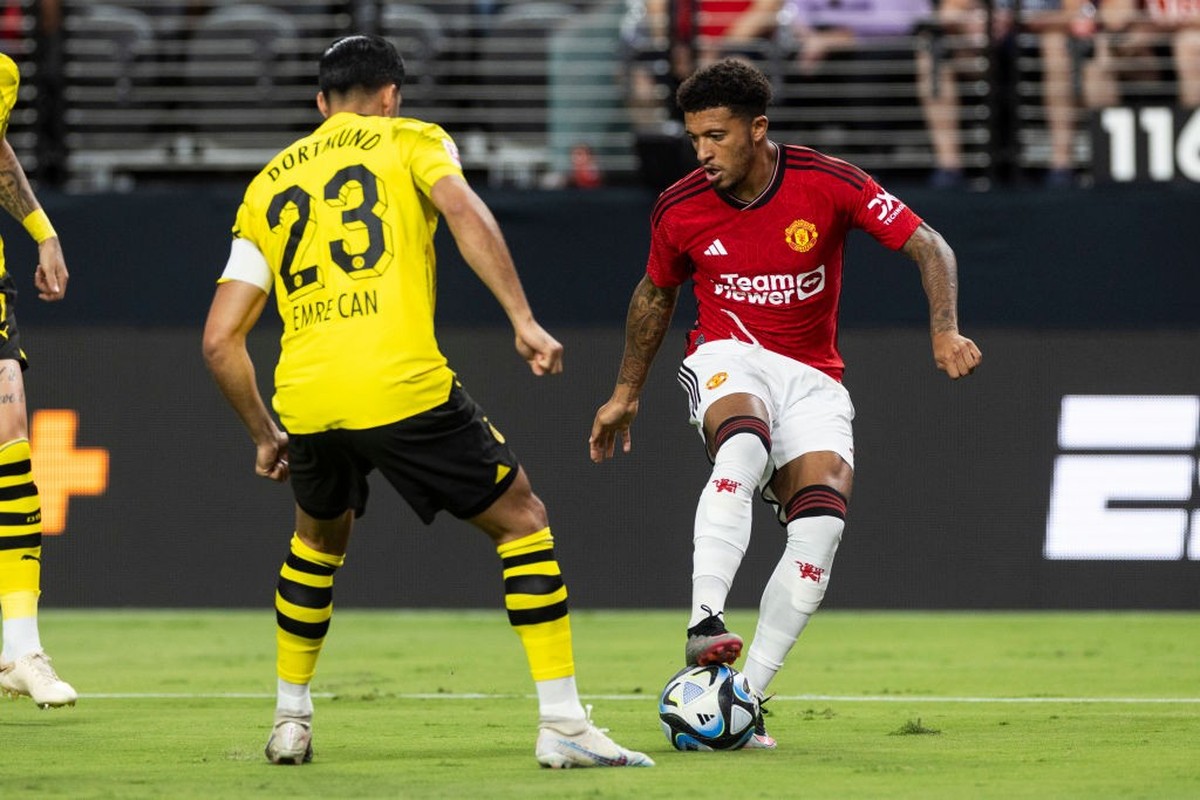LAS VEGAS, NEVADA - JULY 30: Emre Can of Borussia Dortmund and Jadon Sancho of Manchester United battle for the ball during the pre-season friendly match between Manchester United and Borussia Dortmun ...