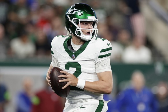 New York Jets quarterback Zach Wilson (2) looks to pass against the Buffalo Bills during the second quarter of an NFL football game, Monday, Sept. 11, 2023, in East Rutherford, N.J. (AP Photo/Adam Hun ...