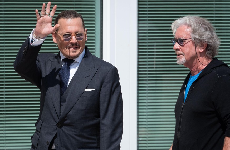 Celebrity therapist Beechy Colclough, 73, walks with Johnny Depp during a break at the Fairfax County Courthouse, in Fairfax, during Depps civil trial with Amber Heard, Tuesday, May 17, 2022. Depp br ...