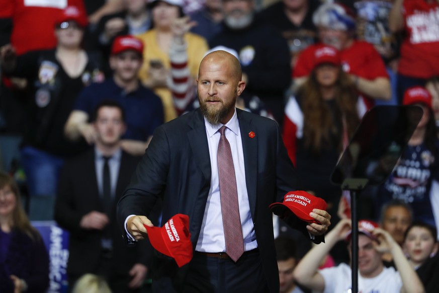 FILE - In this Thursday, March 28, 2019, file photo, Brad Parscale, manager of President Donald Trump&#039;s reelection campaign, throws &quot;Make America Great Again,&quot; hats to the audience befo ...