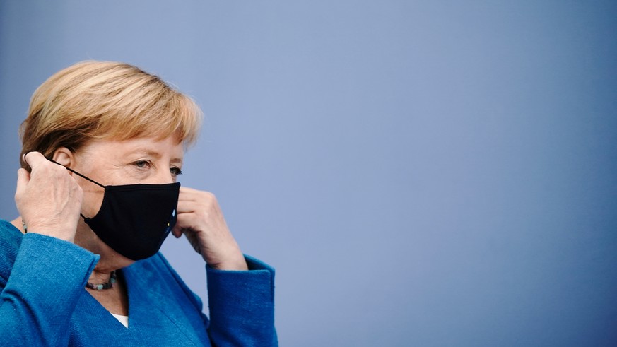 German Chancellor Angela Merkel arrives for her annual summer news conference during the outbreak of the coronavirus disease (COVID-19) in Berlin, Germany, August 28, 2020. Michael Kappeler/Pool via R ...