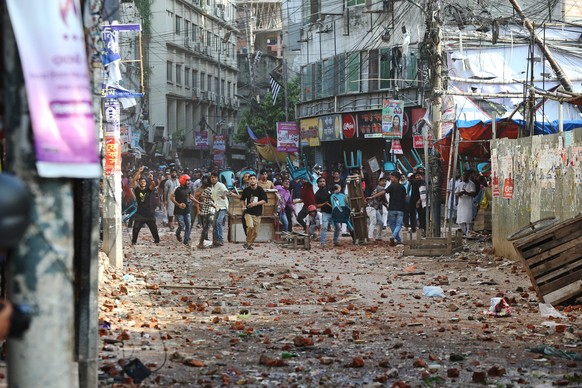 July 16, 2024, Dhaka, Wari, Bangladesh: Anti-quota protesters and students backing the ruling Awami League party clash in Dhaka on July 16, 2024. At least five demonstrators were killed in Bangladesh  ...