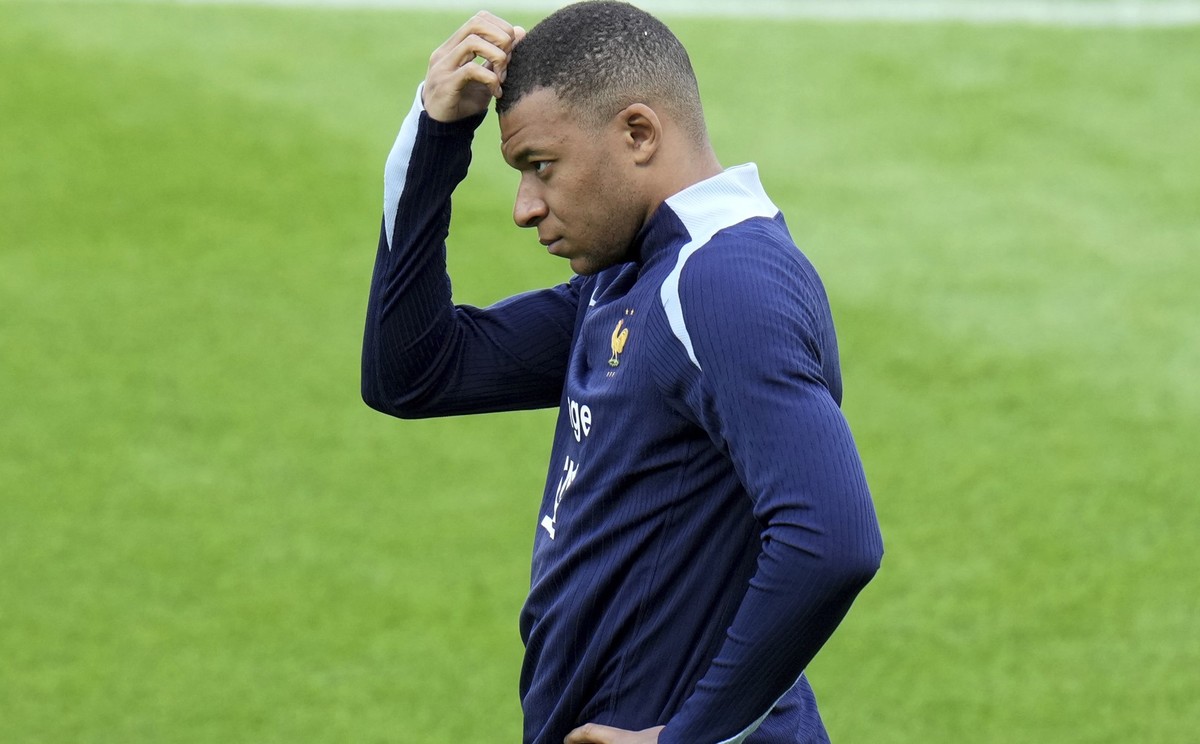 France&#039;s Kylian Mbappe gestures during a training session in Paderborn, Germany, Thursday, June 13, 2024. Mbappé was absent when the squad took part in an open practice session at its European Ch ...
