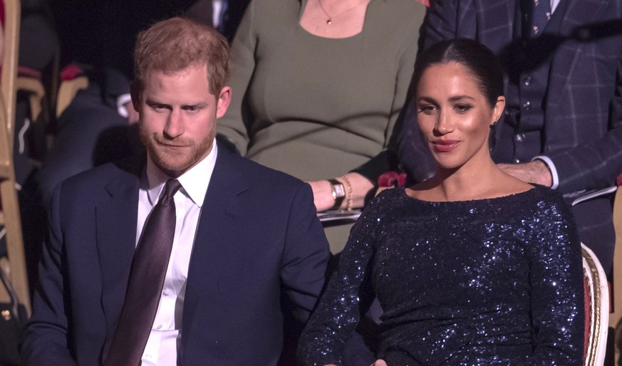 LONDON, ENGLAND - JANUARY 16: Prince Harry, Duke of Sussex and Meghan, Duchess of Sussex attend the Cirque du Soleil Premiere Of &quot;TOTEM&quot; at Royal Albert Hall on January 16, 2019 in London, E ...