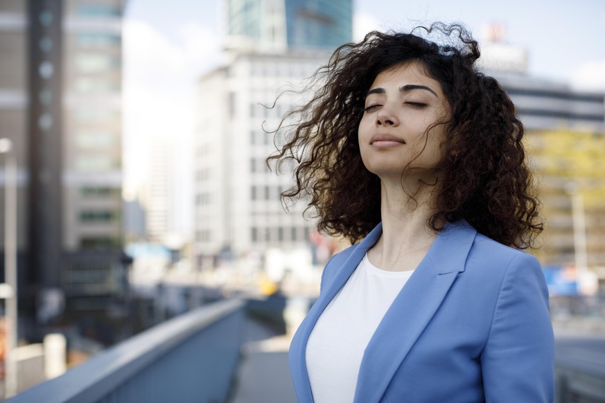 Businesswoman relaxing outdoor