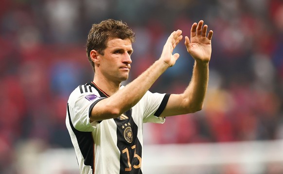 1 December 2022, Qatar, Al-Chaur,: Soccer, World Cup 2022 Qatar, Costa Rica - Germany, preliminary round, group E, matchday 3, in the Al-Bait stadium, German Thomas Müller crosses the pitch after the whistle the final.  ...