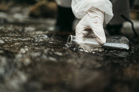 Scientist and biologist researching possibilities for bacteria and virus spreading through natural flowing supplies of drinking water.