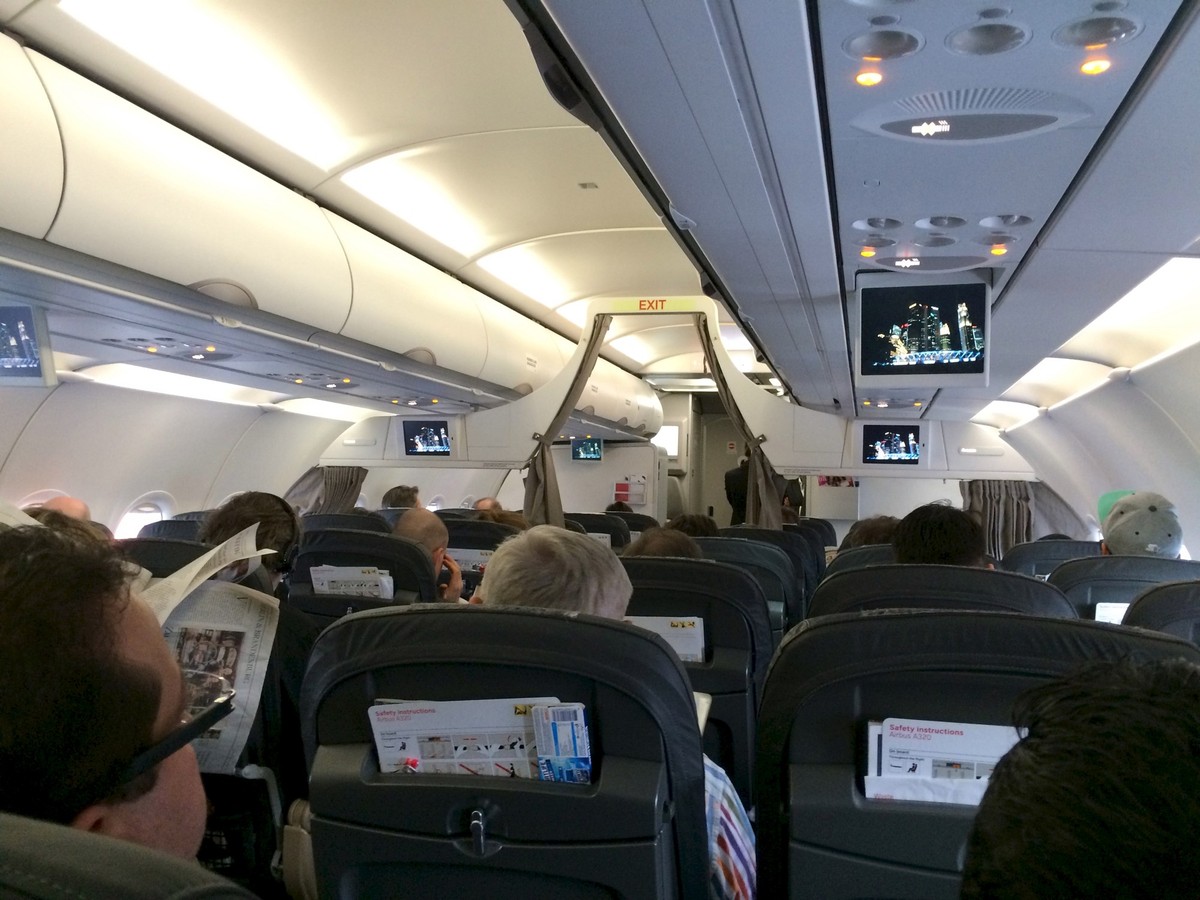BERLIN, GERMANY - MAR 31st, 2015: morning flight from Berlin to Zurich on board an SWISS Airbus A320. xkwx plane, airplane, cabin, aircraft, airline, economy, fly, seat, transportation, travel, air, b ...