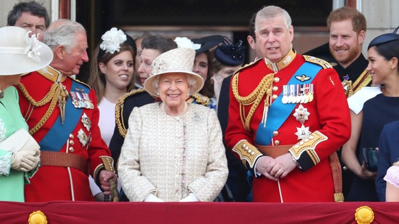 LONDON, ENGLAND - JUNE 08: Prince Charles, Prince of Wales, Princess Beatrice, Princess Anne, Princess Royal, Queen Elizabeth II, Prince Andrew, Duke of York, Prince Harry, Duke of Sussex and Meghan,  ...