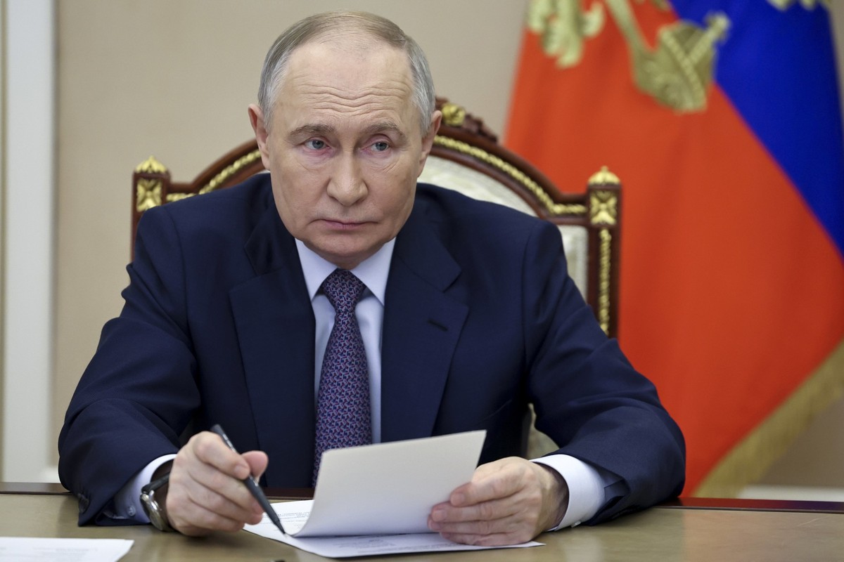 Russian President Vladimir Putin speaks as he attends a ceremony to launch new air and road infrastructure facilities in various country&#039;s regions via videoconference at the Kremlin in Moscow, Ru ...