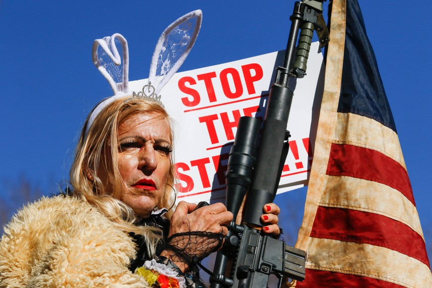 January 16, 2021, Carson City, Nevada, United States: A protestor by the name of Cowboy Barbie, with an AR-15 rifle..Trump supporters gather at the state capital to protest before Biden s inauguration ...