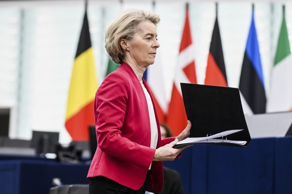 European Commission president Ursula von der Leyen walks to brief European Parliament members on new plans to ramp up defense spending agreed at last week&#039;s summit, Tuesday, March 11, 2025 at the ...