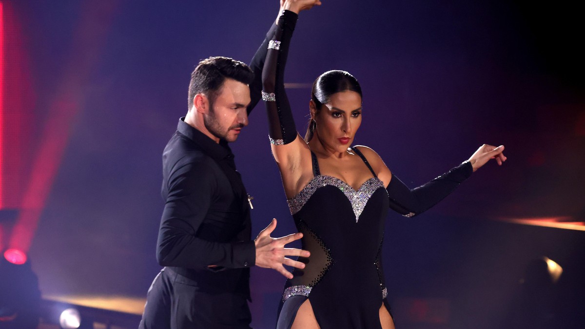 COLOGNE, GERMANY - MARCH 05: Senna Gammour and Robert Beitsch perform on stage during the 1st show of the 14th season of the television competition "Let's Dance" on March 05, 2021 in Co ...