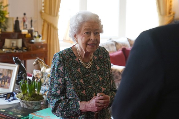 FILE - Queen Elizabeth II speaks during an audience at Windsor Castle where she met the incoming and outgoing Defence Service Secretaries, Wednesday Feb. 16, 2022. Buckingham Palace said Sunday, Feb.  ...