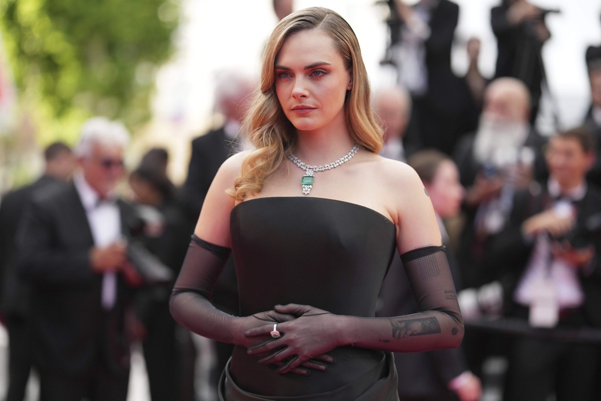 Cara Delevingne poses for photographers upon arrival at the premiere of the film &#039;Colours of Time&#039; at the 78th international film festival, Cannes, southern France, Thursday, May 22, 2025. ( ...