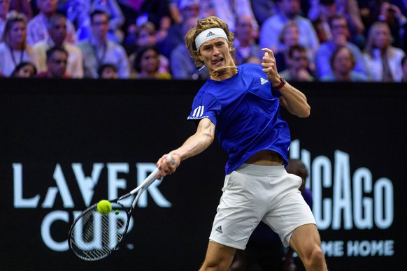 CHICAGO, IL - SEPTEMBER 22: Team Europe s Alexander Zverev of Germany returns a ball to Team World s John Isner of the United States of America during a singles match on day two of the 2018 Laver Cup  ...